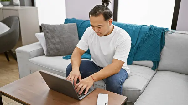 Handsome Young Chinese Man Focused Concentrated Working Online Using Laptop — Stock Photo, Image