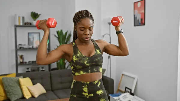 African American Woman Exercising Dumbbells Modern Living Room Displaying Fitness — Stock Photo, Image