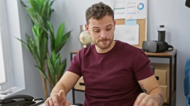 Handsome Young Hispanic Man Beard Wearing Headphones While Working Modern — Stock Video