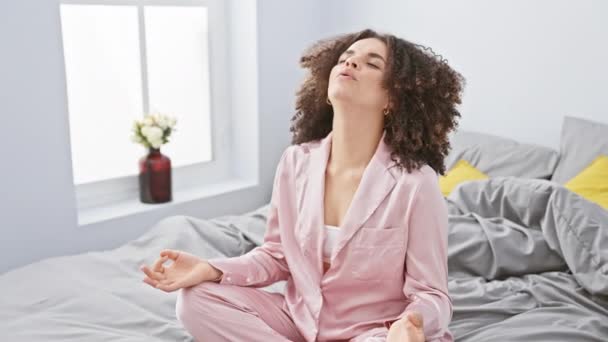 Young Woman Curly Hair Practicing Meditation Pajamas Bed Well Lit — Stock Video