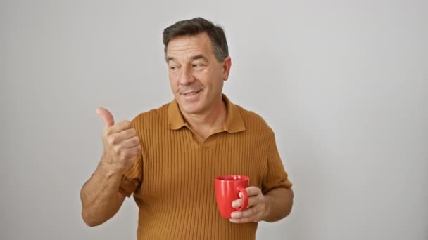 Cheerful Middle Age Man Holding Coffee Cup Confidently Pointing His — Stock Video