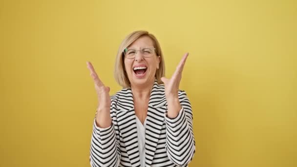 Excited Blonde Middle Aged Woman Striped Jacket Mad Fun Celebrating — Stock Video