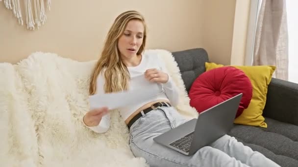 Caucasian Woman Working Paper Laptop Cozy Living Room — Stock Video