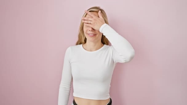 Blonde Beauty Surprise Young Woman Stands Pink Background Hand Covering — Stock Video