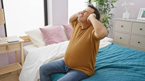 Stressed Middle Aged Man Sitting Bed Bedroom Expressing Headache Frustration — Stock Photo, Image