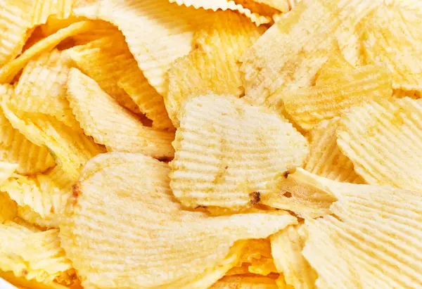 Close View Crispy Yellow Potato Chips Piled Together Showcasing Snack — Stock Photo, Image