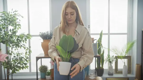 Young Woman Indoors Potting Plant Symbolizing Home Lifestyle Nature Bright — Stock Photo, Image
