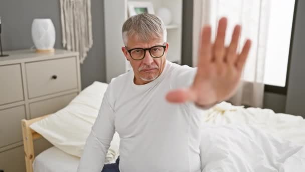 Confident Middle Age Grey Haired Man Pyjamas Hand Raised Serious — Stock Video