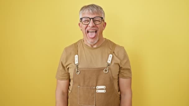 Happy Middle Aged Man Grey Hair Sticking Tongue Out Fun — Stock Video
