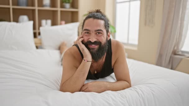 Handsome Hispanic Man Beard Smiling While Lying White Bed Bright — Stock Video