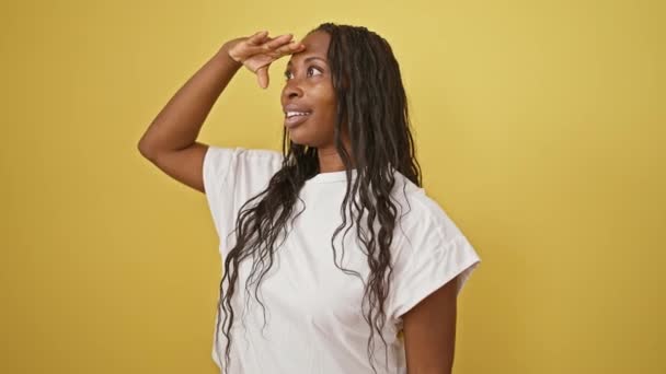 Excited Woman Curly Hair White Shirt Yellow Background Expressing Joy — Stock Video