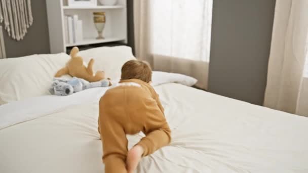 Playful Toddler Boy Enjoys His Time Stuffed Animals Bed Cozy — Stock Video
