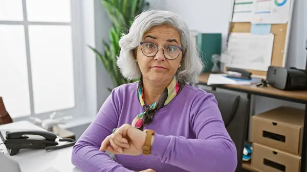 Mature Woman Glasses Checking Time Modern Office Evoking Time Management — Stock Photo, Image