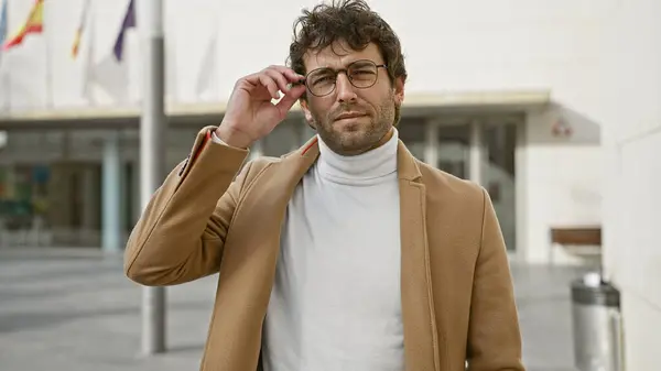 Stylish Man Adjusting Glasses Urban City Street Exudes Confidence Fashion — Stock Photo, Image
