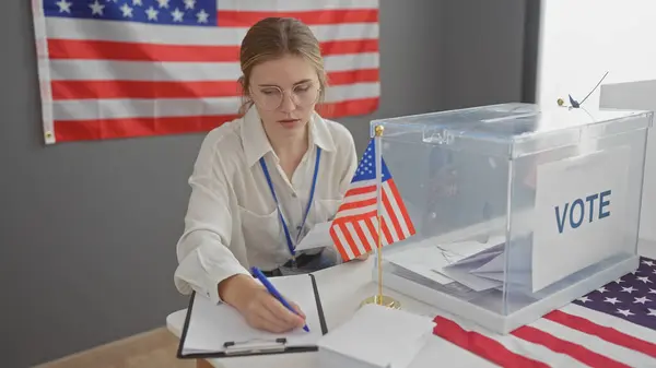Focused Young Woman Glasses Takes Notes Usa Electoral Polling Station — Stock Photo, Image