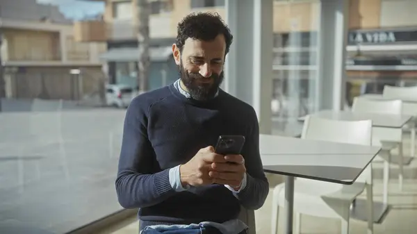 Bearded Man Using Smartphone Sunny Modern Cafe White Furniture Large — Stock Photo, Image