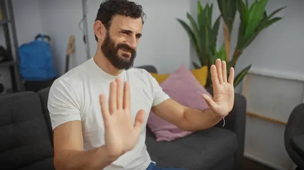 Bearded Man Gesturing Stop Hands Living Room Reflecting Rejection Boundary — Stock Photo, Image