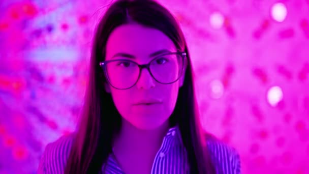 Young Pretty Woman Wearing Glasses Neon Light Modern Studio — Stock Video