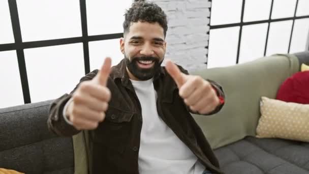 Cheerful Young Man Home Confidently Showing Thumbs Sign Radiant Joy — Stock Video
