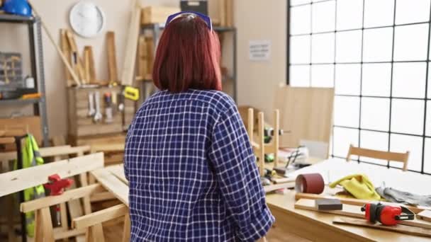 Confident Woman Stands Arms Crossed Carpentry Workshop Surrounded Wood Tools — Stock Video