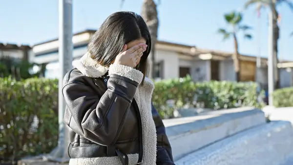 Young Hispanic Woman Distress Covering Her Face Outdoors Park Setting — Stock Photo, Image