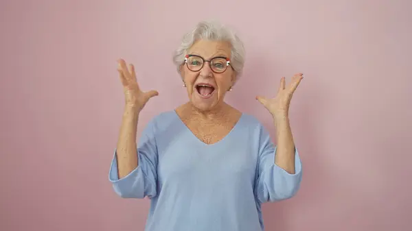 Excited Senior Woman Grey Hair Wearing Glasses Blue Sweater Expressing — Stock Photo, Image