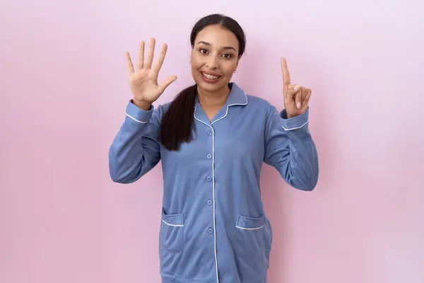 Young Arab Woman Wearing Blue Pajama Showing Pointing Fingers Number Stock Photo