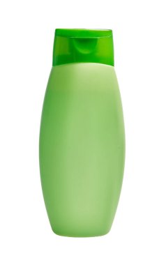 Beyaz arka planda izole edilmiş yeşil plastik bir şampuan şişesi..