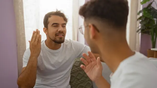 stock image Father and son having a heartfelt conversation in a cozy living room, showcasing family love and connection in an indoor home setting.