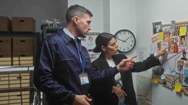 Man and woman officers in a police department examining evidence board with photos and notes. clipart