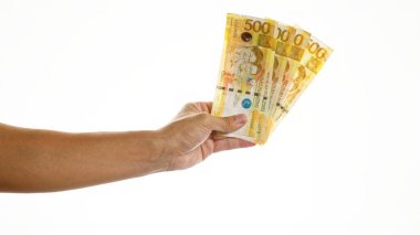 Filipinler 'de beyaz bir arka planda el ele tutuşan Filipinli pesolar..