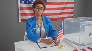 African american woman volunteering at an indoor united states electoral booth with flag clipart