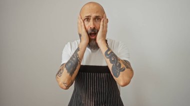 Hispanic man with tattoos on both arms looking surprised against a white background clipart