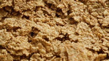 Mısır gevreği dokusunun kapanışı kahvaltı gevreğini detaylı ve çıtır çıtır bir şekilde gözler önüne seriyor.