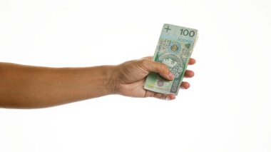 Beyaz arkaplandaki el cila zloti izole edilmiş para birimi değişimi