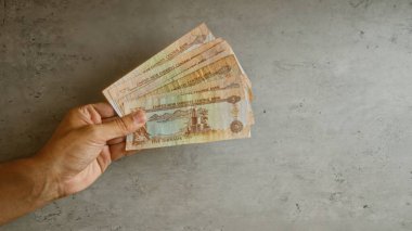 Birleşik Arap Emirlikleri 'nin el ele tutuşması, para birimi hakkında net detaylara sahip somut bir zemine karşı, Ortadoğu finans ve işlemlerini gösteren,.