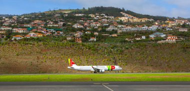 FUNCHAL, PORTUGAL - 31 December 2019: Airplanes docket at Cristiano Ronaldo International Airport at Madeira