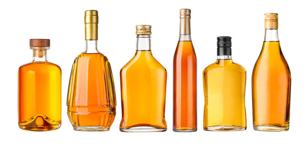 Set of whiskey bottles isolated on white background