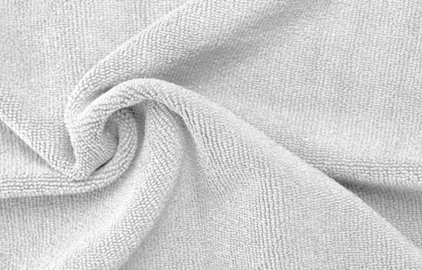 Wrinkled white microfiber cloth texture of microfiber towel closeup