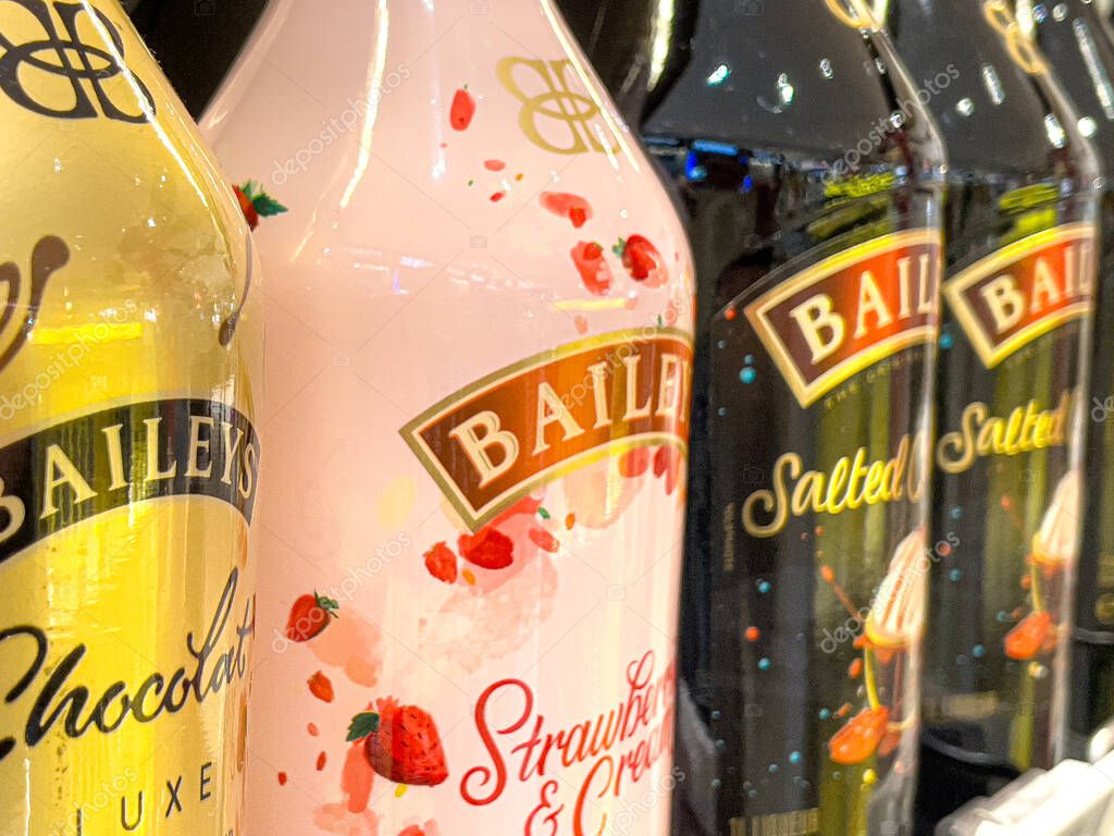 Roma, Italy, 20 December 2023: Baileys Irish Cream  on store shelf in the Duty Free store at Rome Fiumicino Airport. . It is a cream-based liqueur, made by Gilbeys of Ireland.