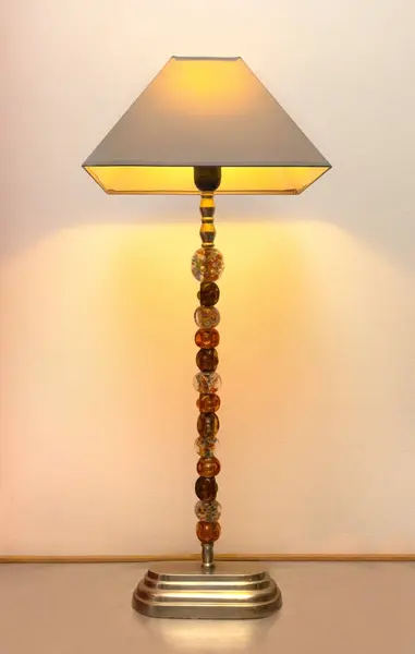 vintage decorative lamp in the interior on the wall background