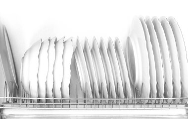 Clean white plates on dish drainer drying after washing clipart