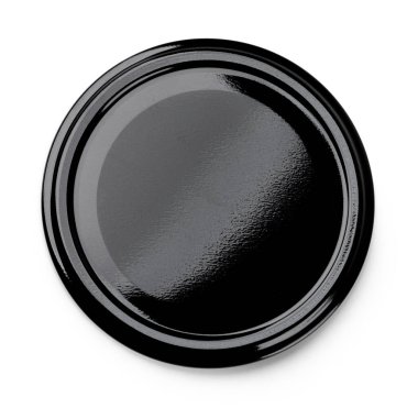 Siyah metal bir kavanozun kapağına yakın çekim yaparak basit ama çarpıcı bir görüntü oluşturur.