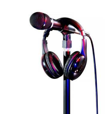 A detailed photograph of a microphone attached to a stand, accompanied by a pair of headphones neatly placed over the microphone setup, with vibrant lighting on a clean white background for contrast. clipart