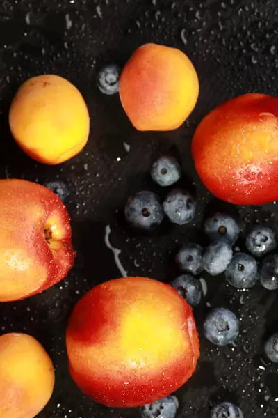 stock image fresh nectarines in water drops