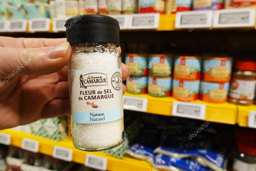 THE NETHERLANDS - JANUARY 2024: Jar of Fleur De Sel Le Saunier de Camarque a salt extracted in France for sale in a Dutch Hanos wholesale