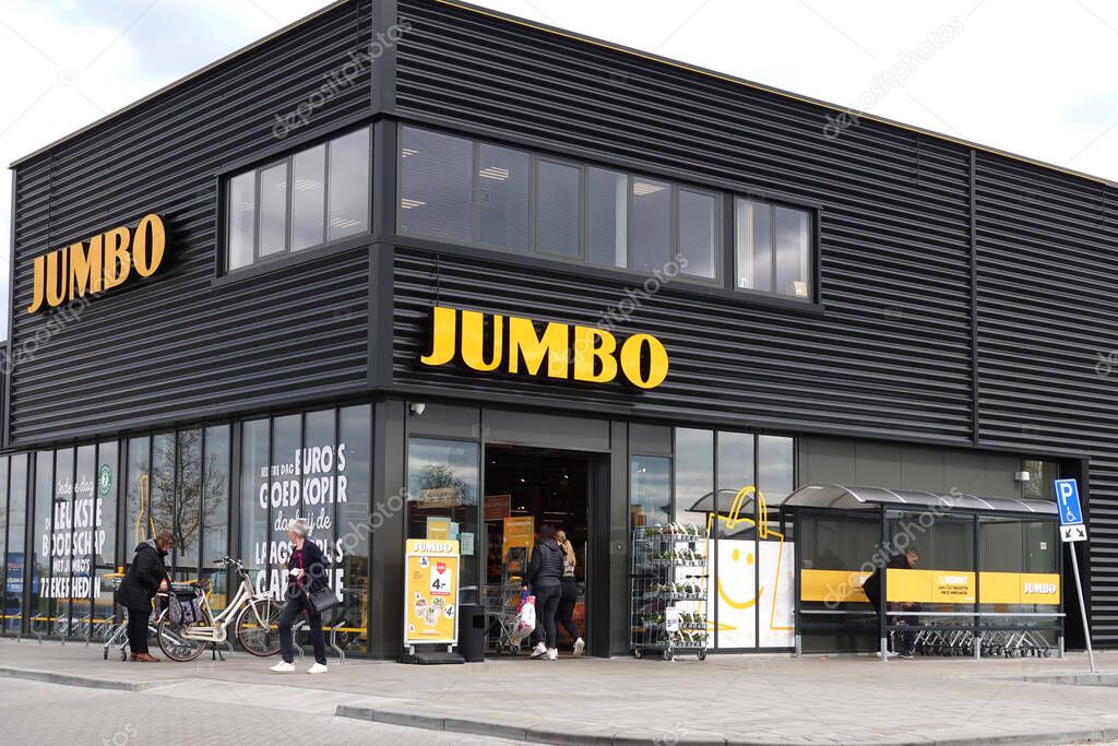 GORREDIJK, THE NETHERLANDS - MAY 2023: Customers enters a Jumbo supermarket for daily shopping. Jumbo is a supermarket chain with branches in the Netherlands and Belgium.