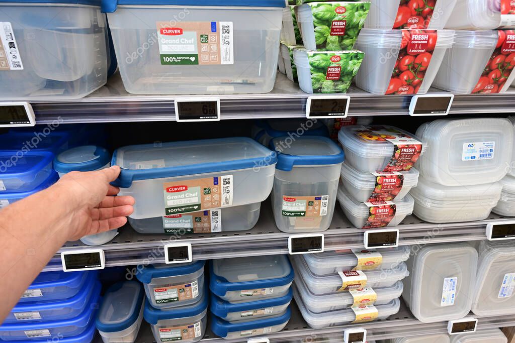 ALSACE, FRANCE - MAY 2025: Shelves with plastic household kitchenware for sale in a E.Leclerc Hypermarket. The brand name Curver, is a Dutch manufacturer of plastic household articles.