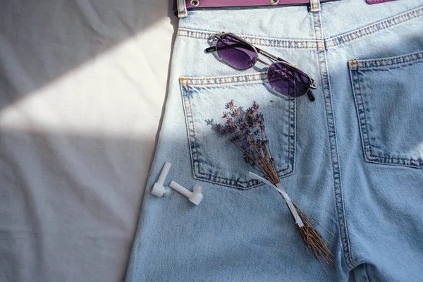 Denim Shorts Sunglasses Lavender Bouquet Bed — Stock Photo, Image