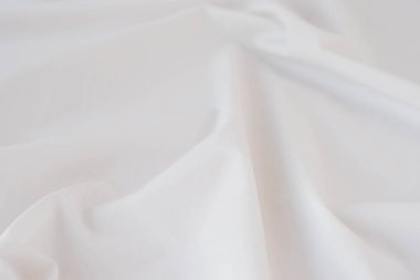 Arka plan için beyaz kumaş dokusu. Arkaplan için soyut beyaz kumaş dokusu.